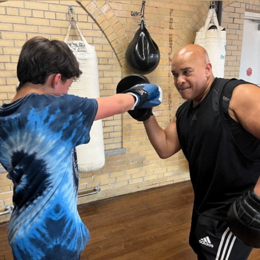 teen boy boxing